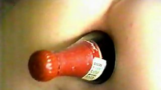 Champange bottle in her asshole