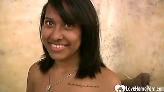 Seductive dark hair Indian teen blowing