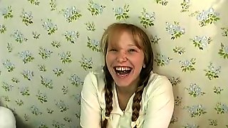 Horny schoolgirl in pigtails with pierced