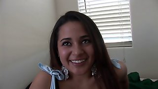 Chubby brunette with long hair at home