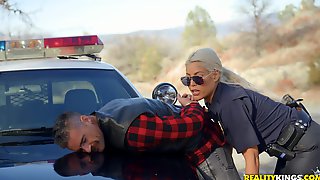 Naughty police woman Bridgette B catches