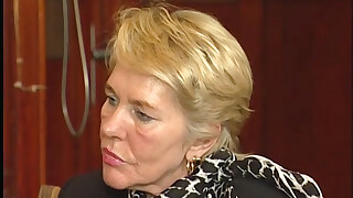 Blonde granny gets fucked in the office