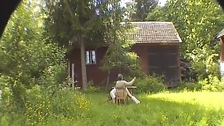 Stern grandmother spanks granddaughter